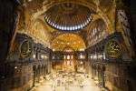 The lit up interior of the Hagia Sophia