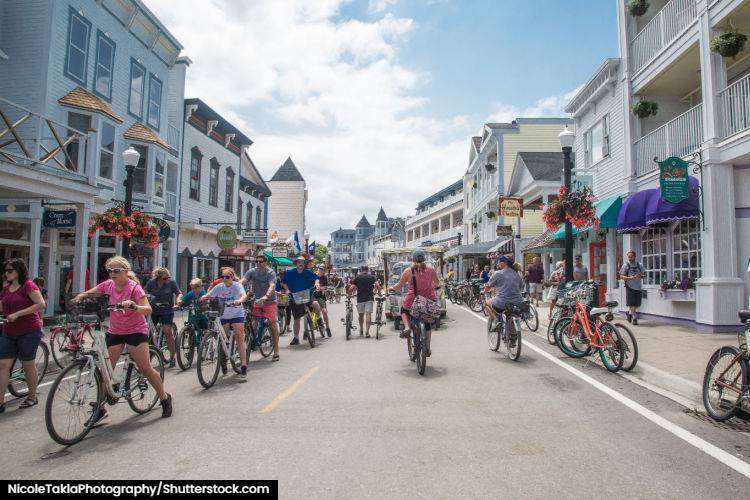 Tourists on bicycles on Mackinac Island