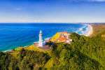 Panoramic view of the lighthouse, headland and beach at Byron Bay