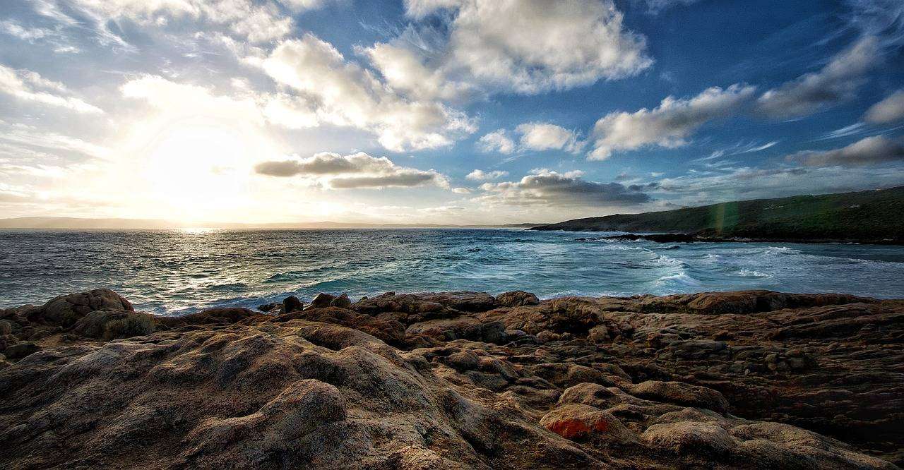 Rocky headland overlooking beach and sea in Bremer Bay